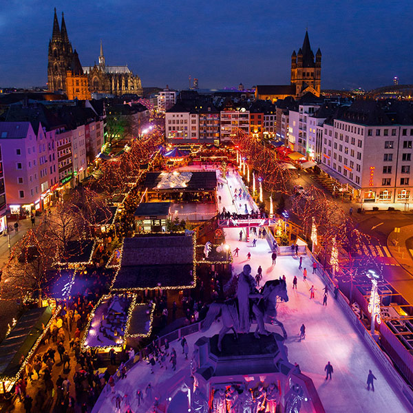 Heumarkt ice rink in Cologne’s Old Town, with view of cathedral
